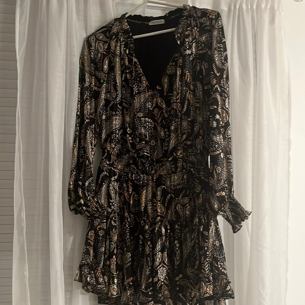 Super cute neutral colored dress size medium but fits small